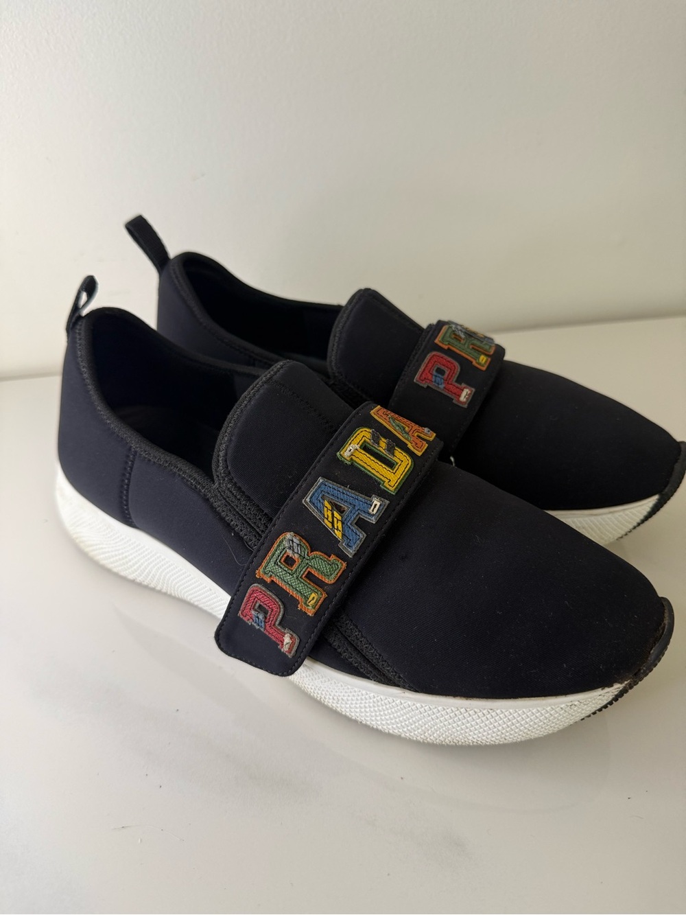 Prada Black Neoprene Slip-On Sneakers with Multicolor Logo Strap